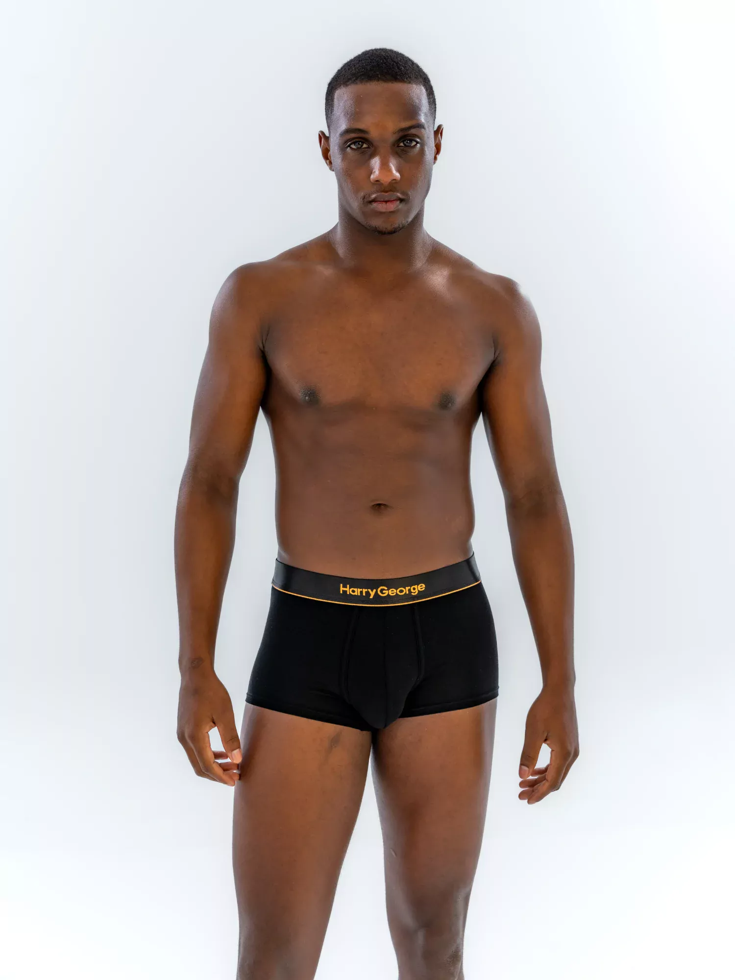 Model wearing the 1" Classic Trunk in black, front view