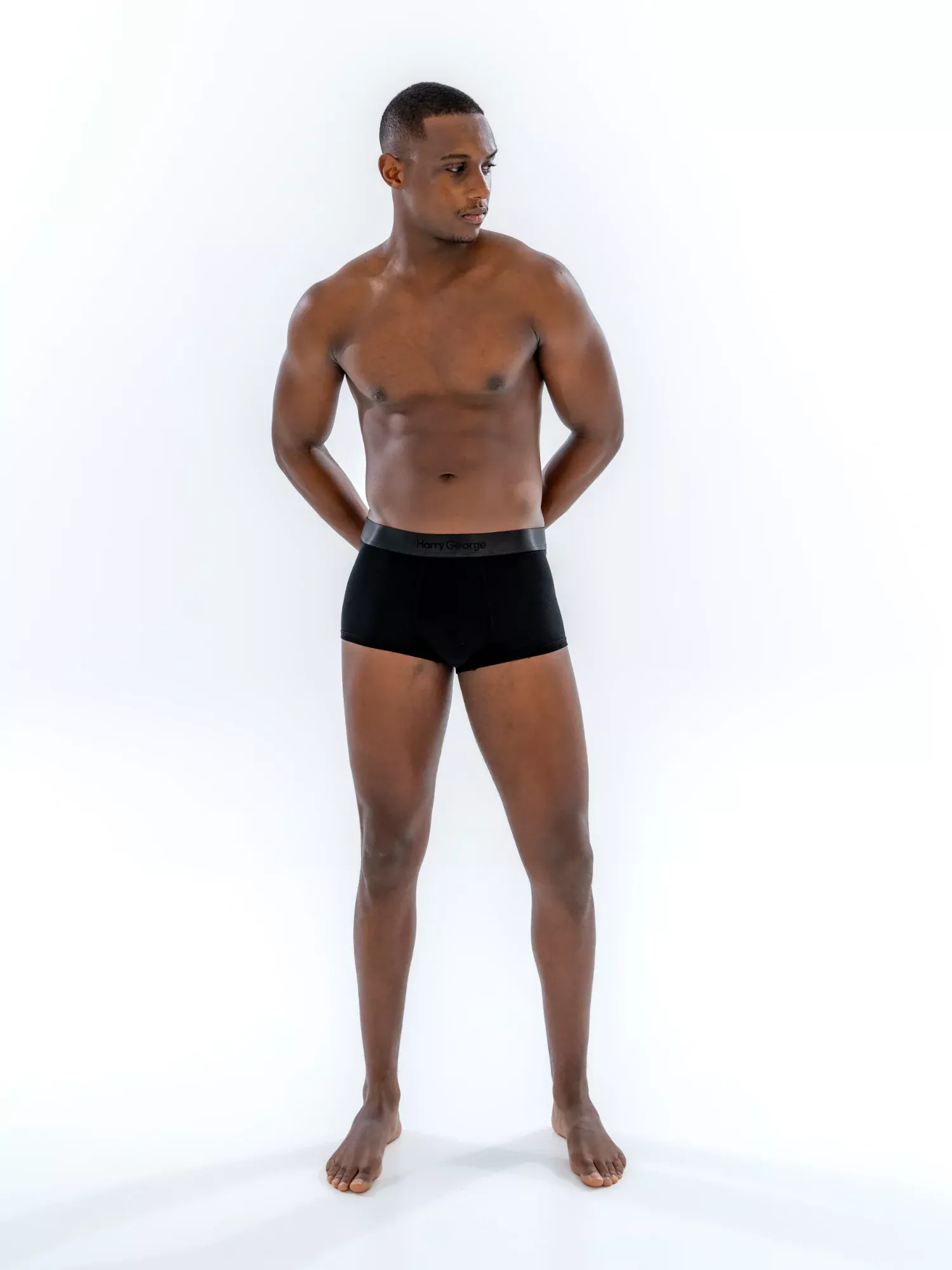 Model wearing the 1" Tonal Trunk in black, front view