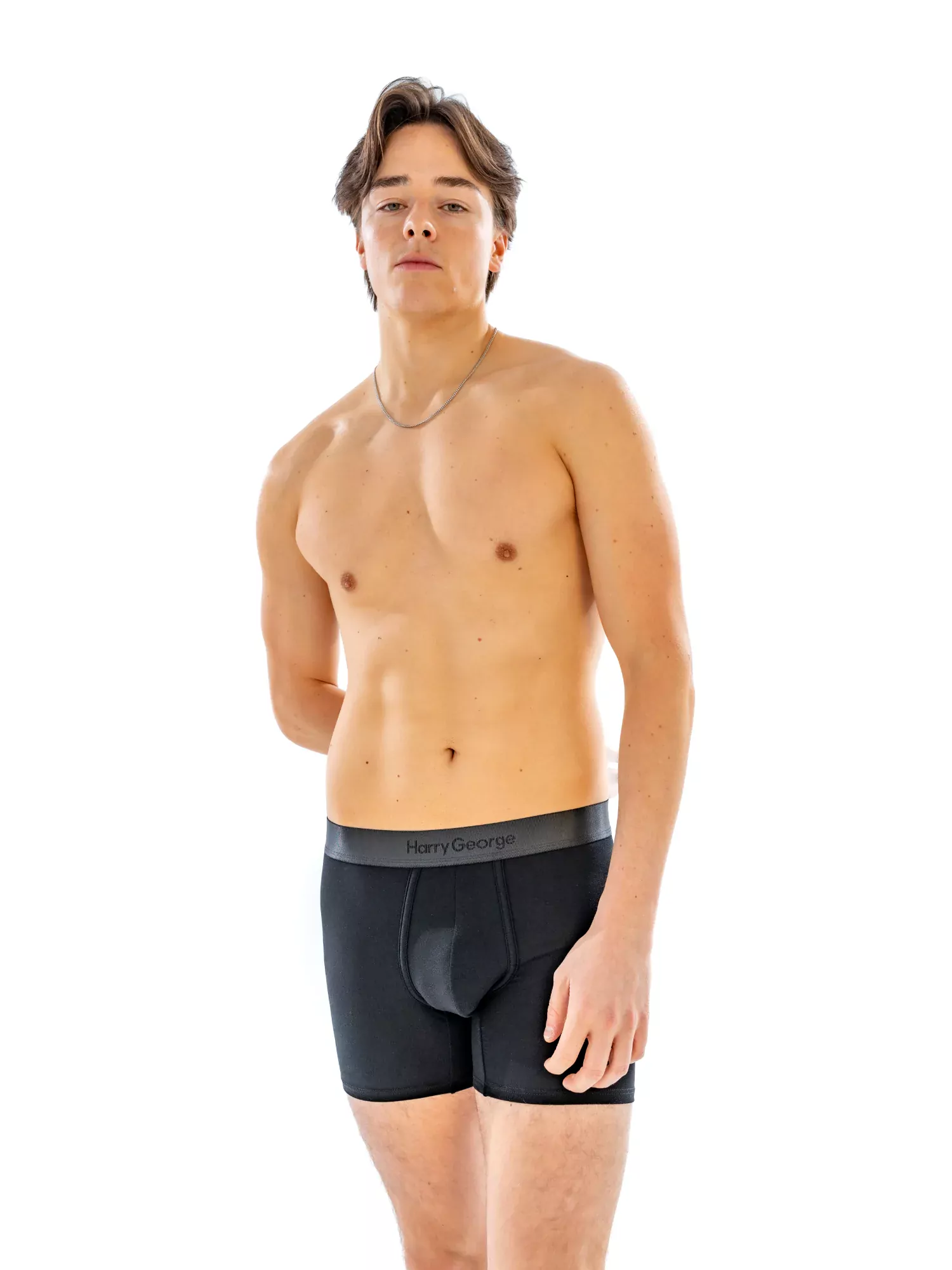 Model wearing the 4" Tonal Boxer Brief in black, front view