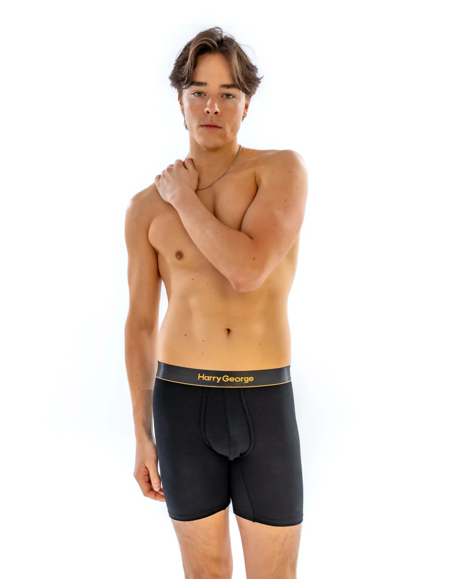 Model wearing the 6" Classic Boxer Brief in black, front view